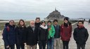 Dr. Felix Frey, Verena Müller, Prof. Dr. Frank Hochholdinger, Marcel Baer, Jutta Baldauf, Dr. Caroline Marcon, Dr. Peng Yu, Annika Kortz and Yan Naing Win in front of Mont-Saint-Michel.