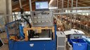 Equipment for measureing emissions inside a milking parlor.